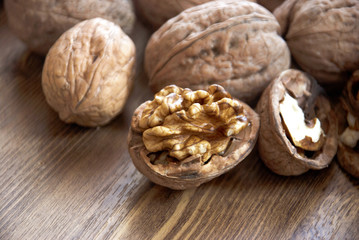 walnuts on the wooden-table.Walnut, Nut - Food, Variation, Food, Seed