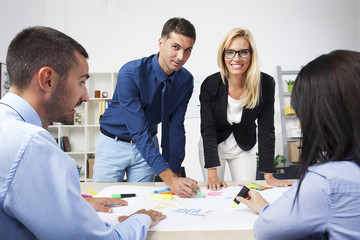 Group Of Business People Having Meeting In Office. Team work