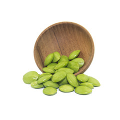 Sato seeds, Parkia speciosa seeds or bitter bean in bowl isolate