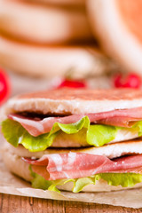 Tigella bread stuffed with ham and lettuce. 