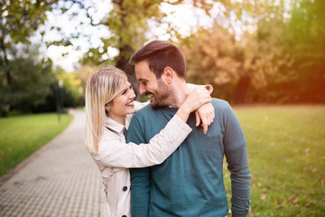 Fototapeta premium Happy couple walking in park