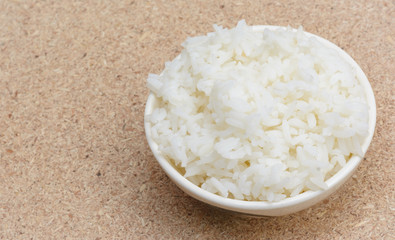 rice on bowl on wood table