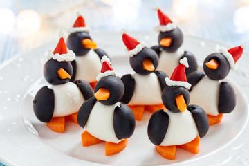 olive penguins snack with santa hat