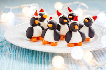 olive penguins snack with santa hat