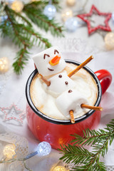hot chocolate with melted marshmallow snowman