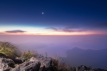 Naklejka premium Landscape view on top of mountain with stars. 
