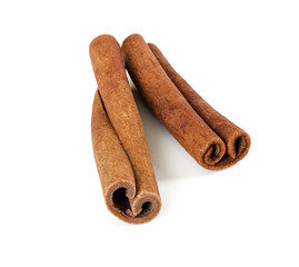 Two cinnamon sticks isolated on white background.