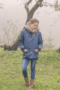 woman walking alone in nature