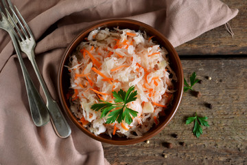 Marinated, sour cabbage with carrots and onions