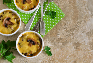 Baked chicken with mushrooms in a cream sauce with cheese