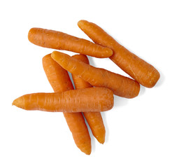 A pile of whole raw carrots isolated on a white background