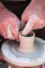Fototapeta premium hardworking hands of the potter 3