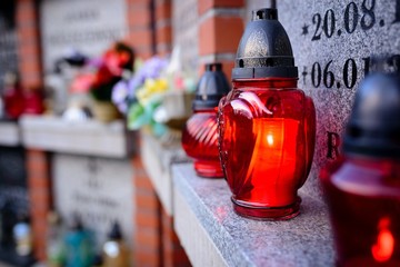 Candles burning at a cemetery