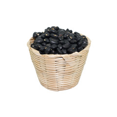 Wooden bowl of dry black beans on white