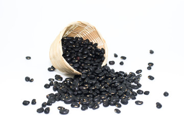 Bamboo Basket of dry black beans on white