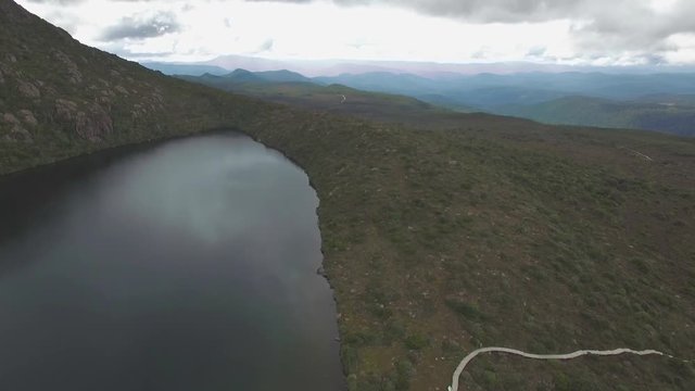 Forward flight passing Lake Esperance, Hartz Mountains National Park, Tasmania, Australia