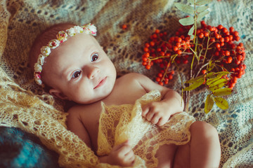 little amazing girl lying on the big bed