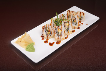 Sushi rolls on a white plate