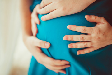 happy man  expecting a child from his beloved woman