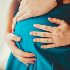 Fototapeta premium young man expecting a child from his beloved woman