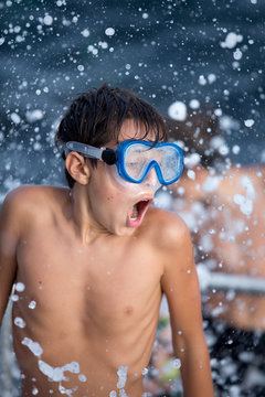 Young swimmer in swimming mask.