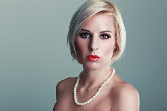 Woman With A Pearl Necklace