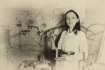 Ghostly image of a woman holding a severed hand