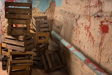 Empty wooden packing crates in a Halloween horror concept
