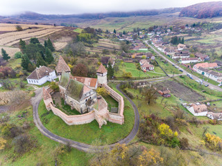Saxon fortified church at Alma Vii Transylvania Romania. Aerial