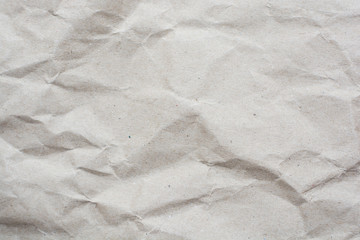 Naklejka premium crumpled cream color tone paper pattern texture background