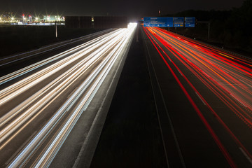 Fototapeta na wymiar highway traffic lights at night