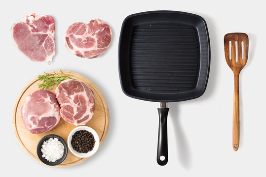 Top View Of Mockup Raw Pork Chop, Bbq Steak And Pan Set Isolated.