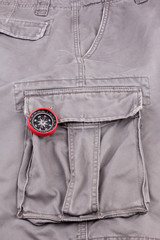 Military pants and compass