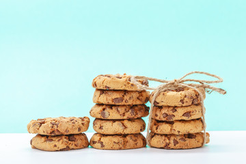 chocolate chunk cookies on a bright blue background