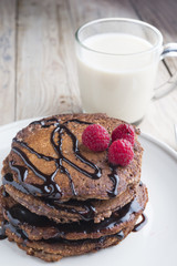 Pancakes with chocolate and berry