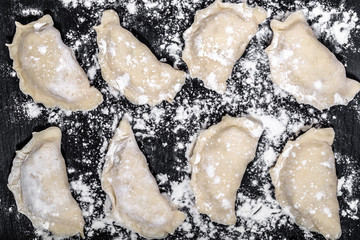 Raw dumplings background, cooking homemade