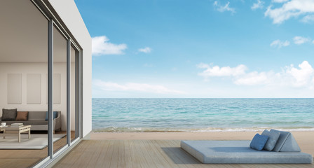 Fototapeta na wymiar Outdoor living, Beach house with sea view in modern design - 3d rendering