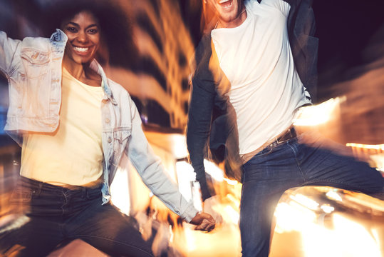 Beautiful interracial couple posing in a zoom in effect photo
