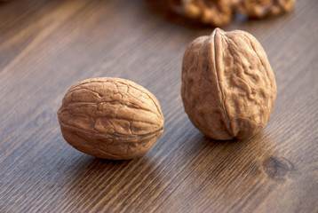 walnuts on the wooden-table.