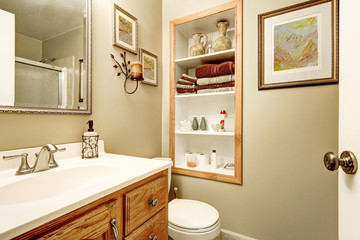 Interior of bathroom with built-in shelves