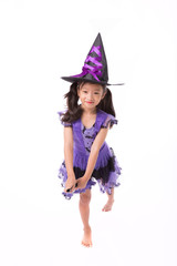 Little halloween witch girl costume isolated on white background