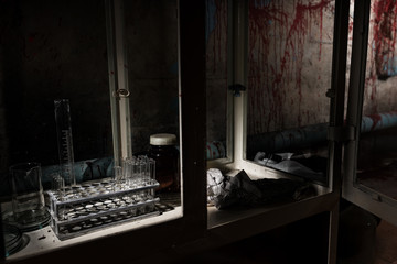 Stained laboratory with test tubes holder in dark room in a Hall