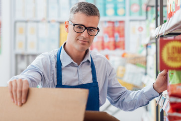 Supermarket clerk at work