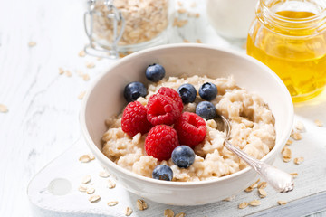 homemade oatmeal with berries for breakfast 