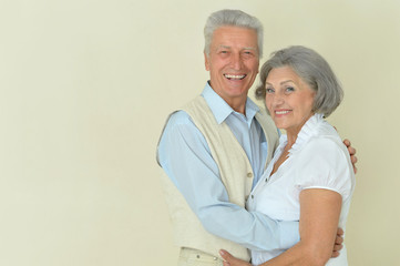 Mature couple near wall