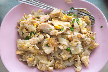 Stir fried rice noodle with chicken and egg, famous Thai food