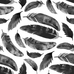 Watercolor seamless pattern with black feathers on white