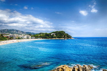 Fototapeta premium Panoramic view of resort town and beach. Blanes, Catalonia, Spain