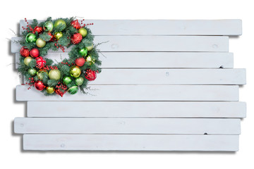 White wooden surface with Christmas wreath