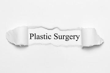 Plastic Surgery on white torn paper